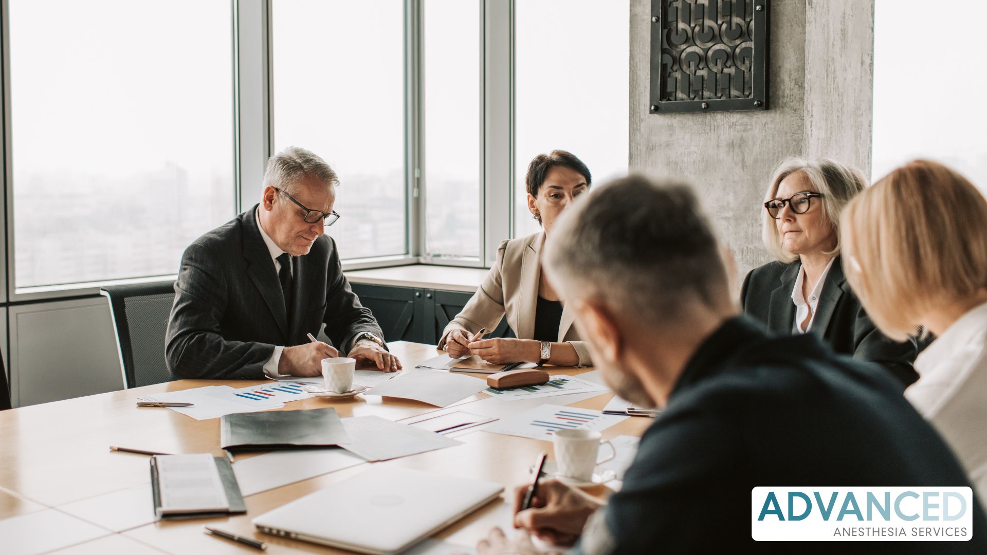 executive around a table